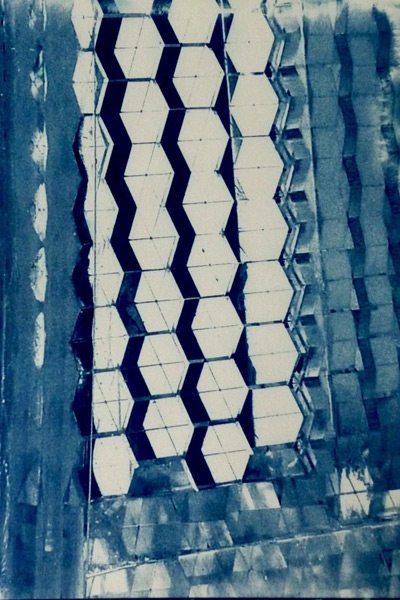 Cyanotype of a broken piece of bike reflector